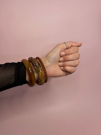 Bracelet tressé en acétate, vintage et chic. Il est intemporel. 
